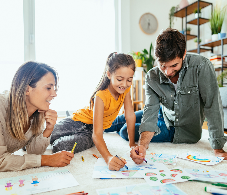 family-sitting-on-floor-coloring